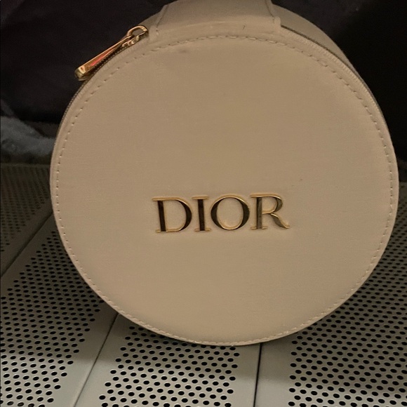 Dior Handbags - Dior Cream Round Cosmetic Bag with Gold Accents